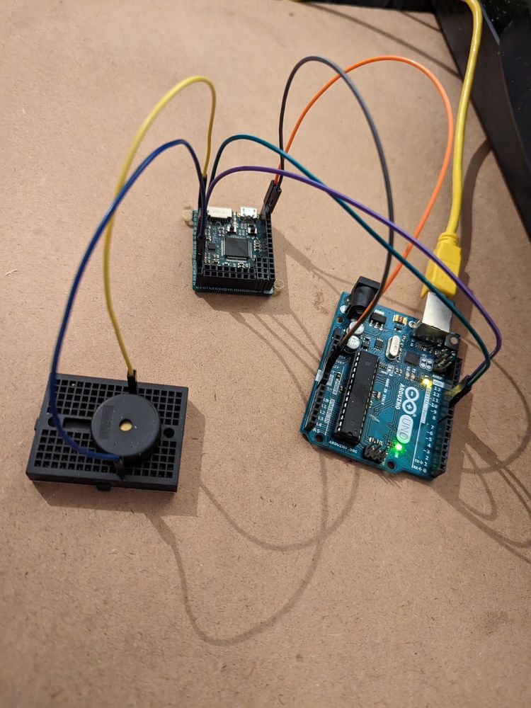 Arduino Uno, pyboard and a buzzer